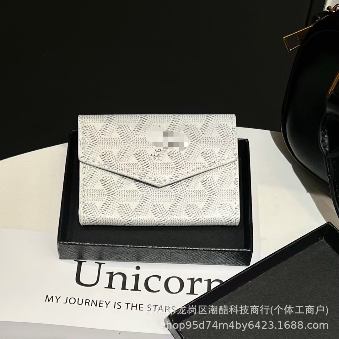 Dog tooth accordion bag white