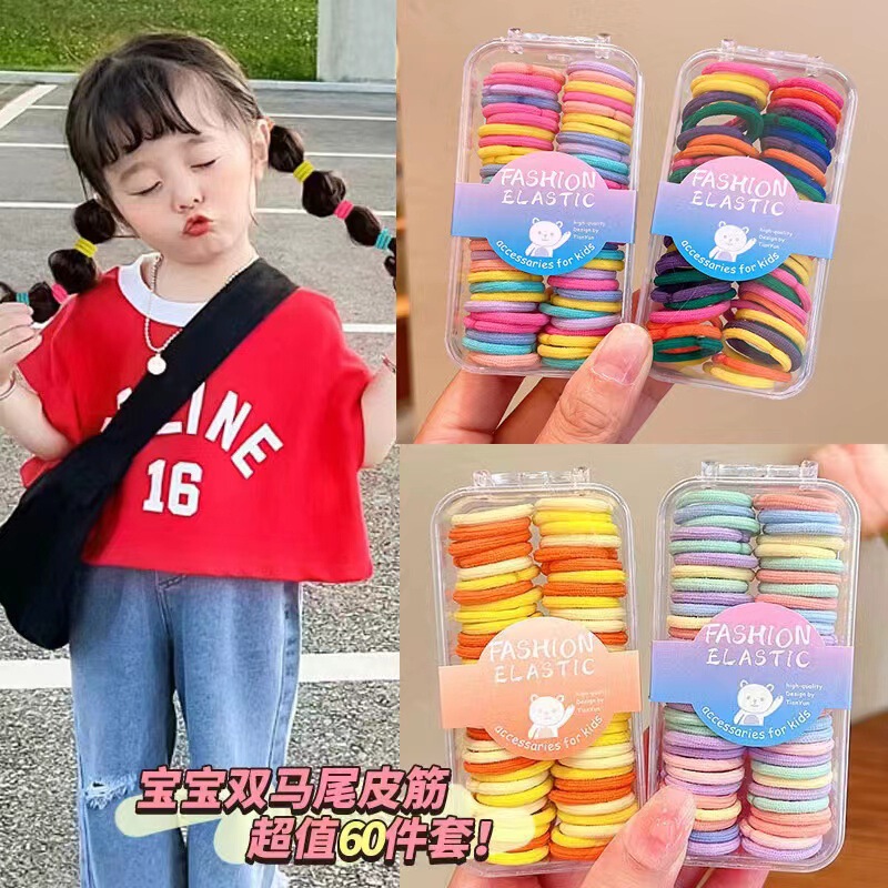 かわいい萌え赤ちゃんの子供のヘアリングの箱の中のひもの小さい皮の筋の高弾力の髪のひものかわいい女の子のカラーは弾力性を傷つけません。|undefined