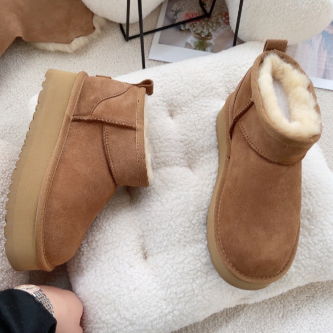 冬の女性の厚い底の周の冬の雨の雪の靴の4CMの羊の毛皮の一体の綿の靴は高くなって厚くて暖かいビスケットの底を厚くします。|undefined