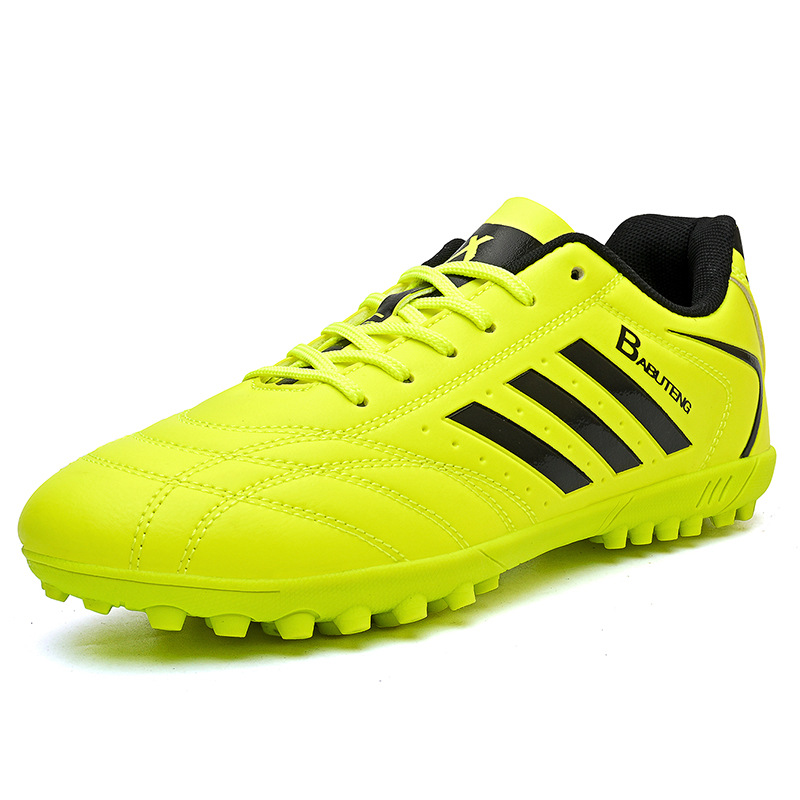 Zapatos de fútbol en stock, zapatos de entrenamiento anti-deslizante para niños, respirados y amortiguados, zapatos de entrenamiento juvenil