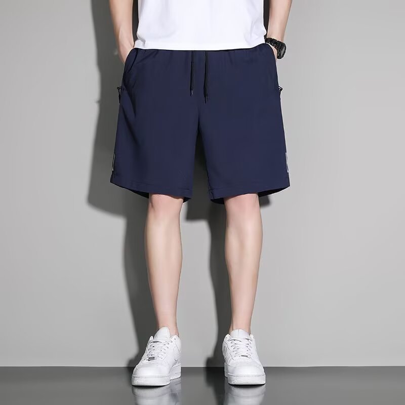 Pantalones de cinco puntos de verano para hombres con una sensación de hielo delgada secado rápido y transpirable, pantalones cortos deportivos de baloncesto casuales de tamaño grande