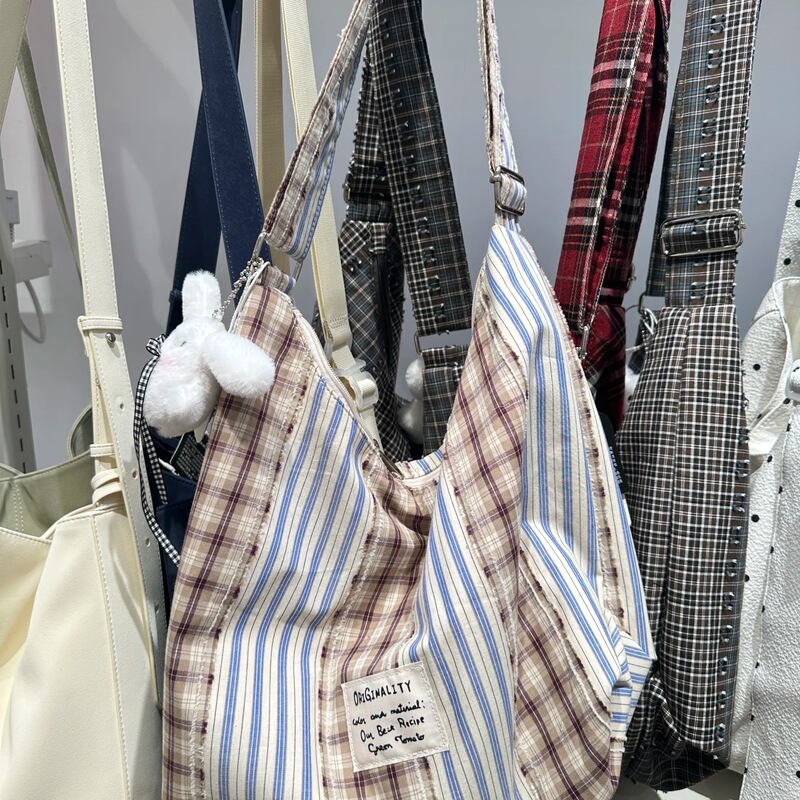 韓国ピンクヒョウ柄キャンバスバッグ女性のための 2025 新しい大容量通勤トートバッグニッチショルダークロスボディバッグ|undefined