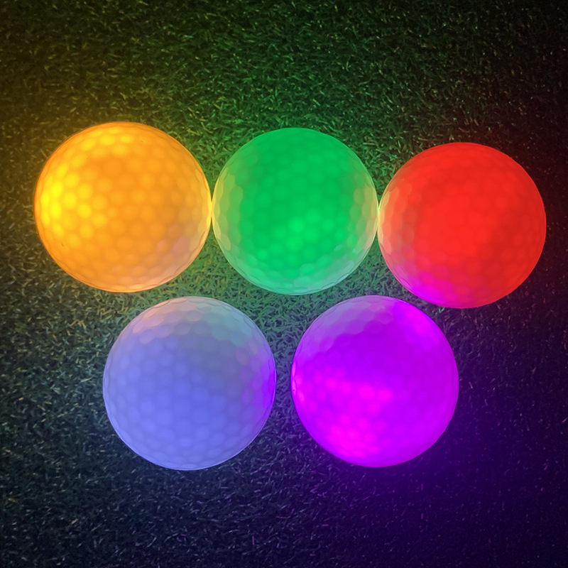 LED luminoso Juego de Pelota de GOLF automático de siete colores GOLF noche CAMPO DE GOLF pelota de práctica al por mayor
