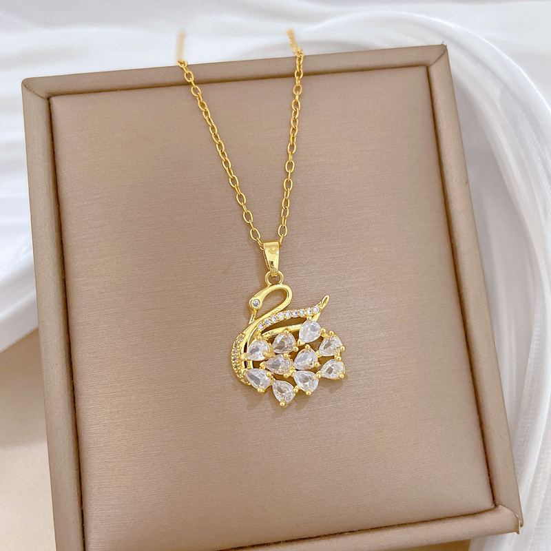 Collana con cigno e cristalli in acciaio titanio per donna_voghion.com