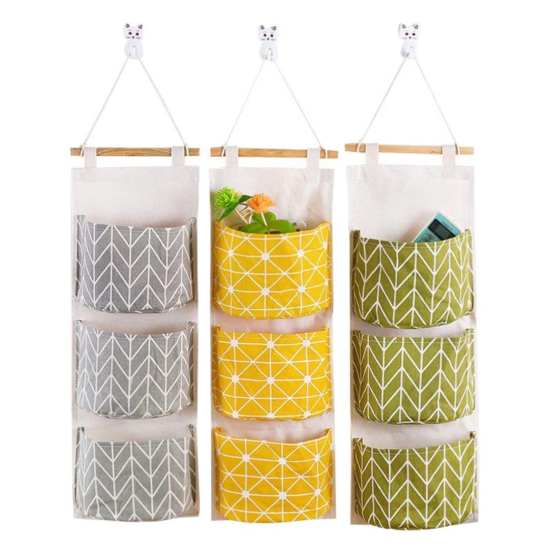 Bolsa colgante de almacenamiento de algodón y lino impermeable colgando tela tres bolsillos colgando bolsa detrás de la puerta bolsa de almacenamiento de artículos diversos bolsa de almacenamiento al por mayor