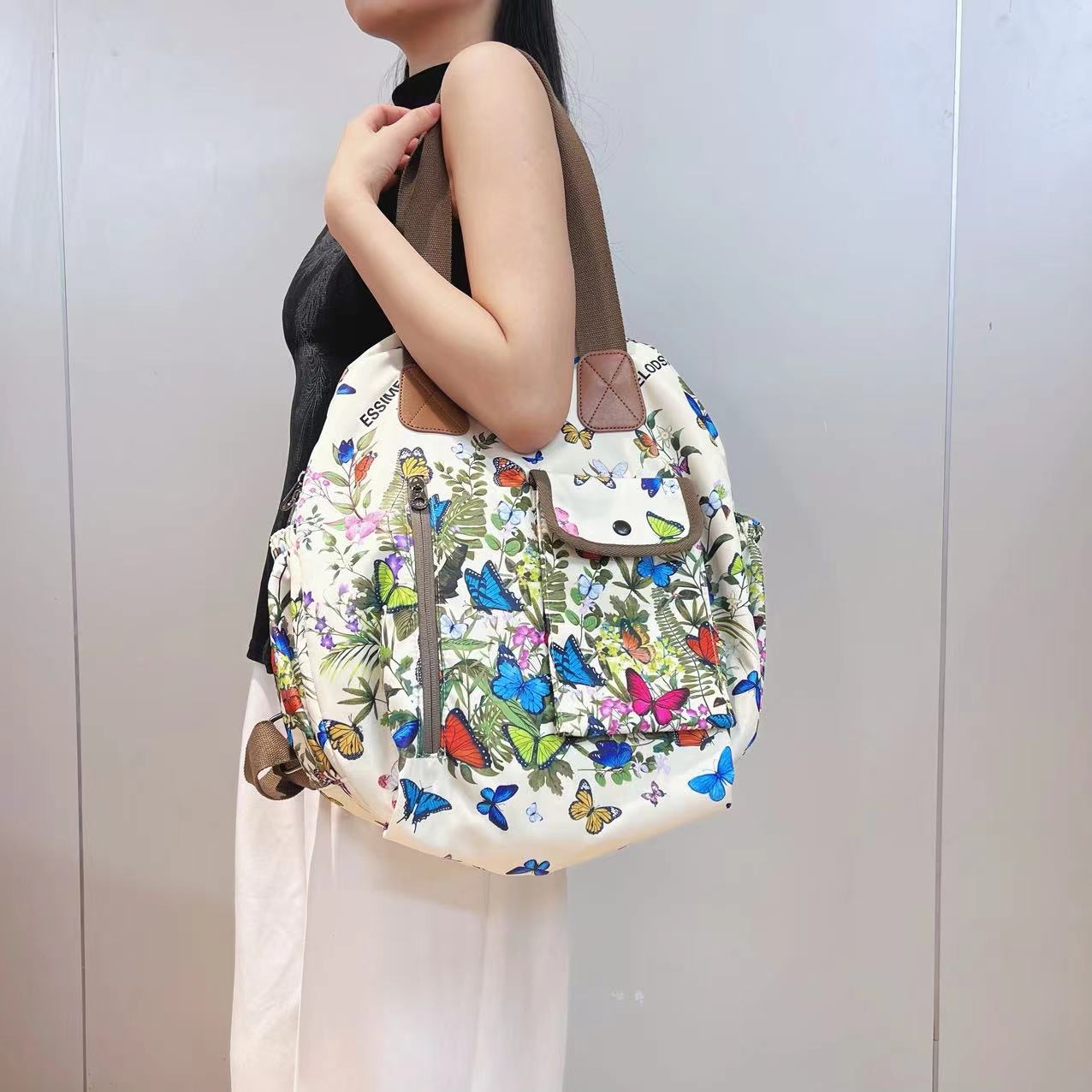 2024 moda explosiva gran capacidad versátil mochila multifuncional para viajar a la escuela mochila de tendencia ligera