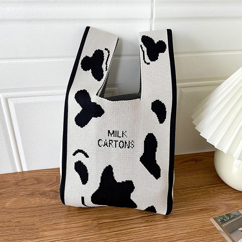 Bolsa de las mujeres de estilo coreano diseño de nicho lindo bolso de mano de punto de dibujos animados calle estudiante gran capacidad bolsa de las axilas