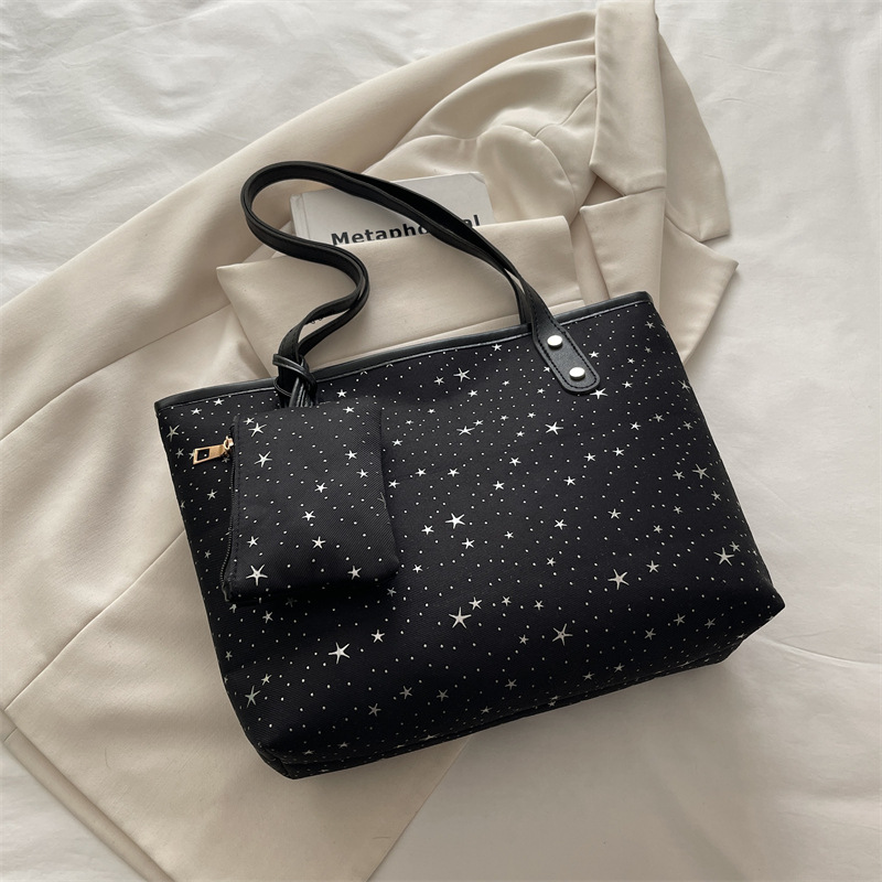 2026 primavera nueva bolsa de hombro de gran capacidad bolsa de brazo universal tendencia transfronteriza dulce viento bolso de mano bolso de mujer