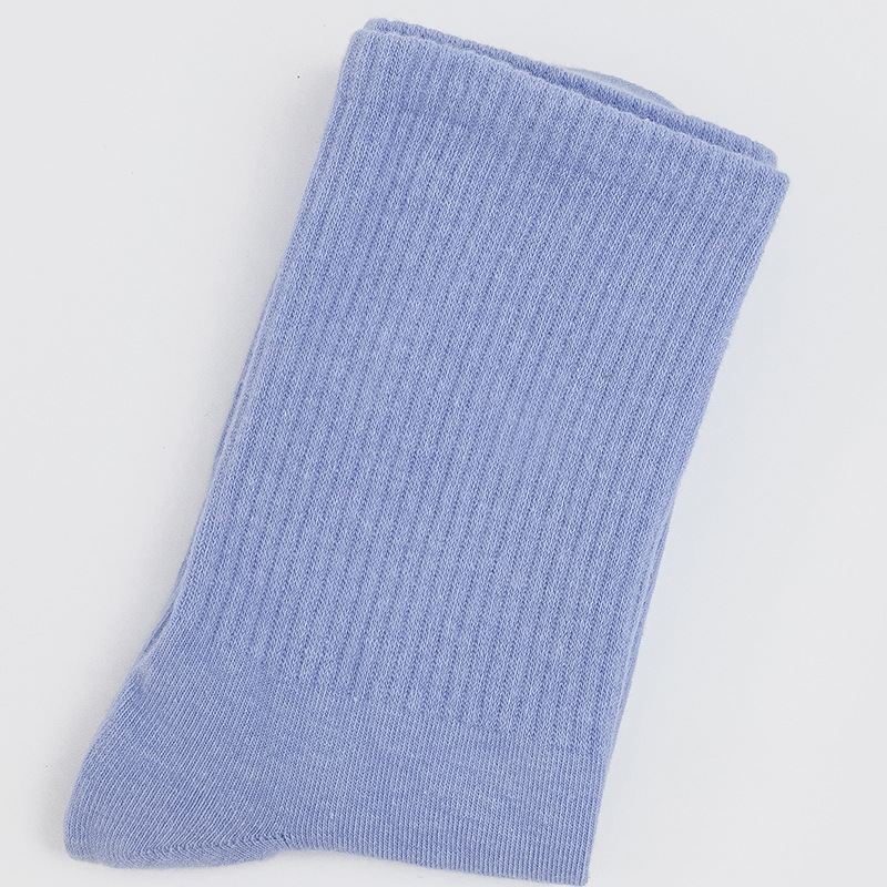 Calcetines de mujer para primavera y otoño, calcetines de algodón de color liso, versátiles y a la moda, calcetines holgados, calcetines de longitud media, calcetines deportivos que absorben el sudor, venta al por mayor.