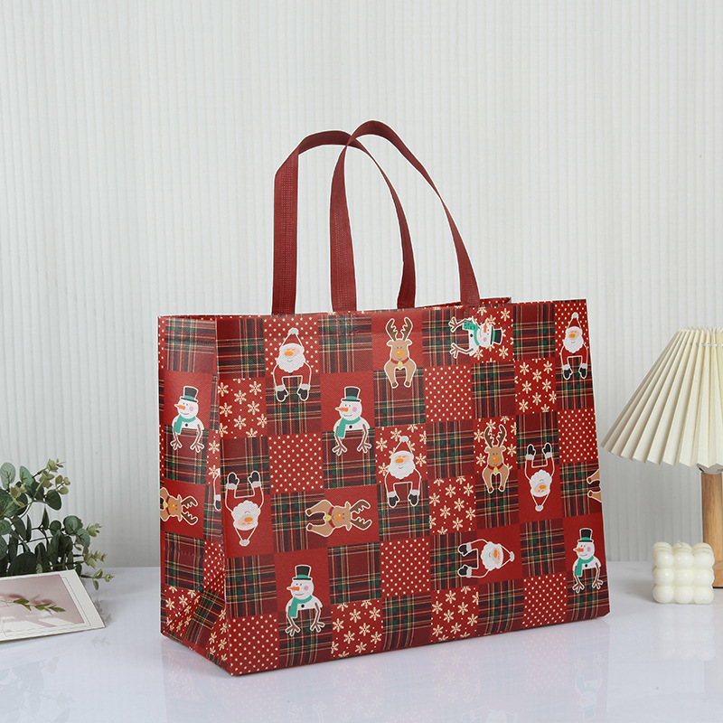 Bolso de Navidad de punto transfronterizo, bolsa de embalaje de regalo, bolsa no tejida laminada en caliente plegable portátil personalizada