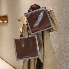 Taro purple hand-held packaging bag, chocolate high-end color clothing gift plastic bag, simple and generous bag clothing