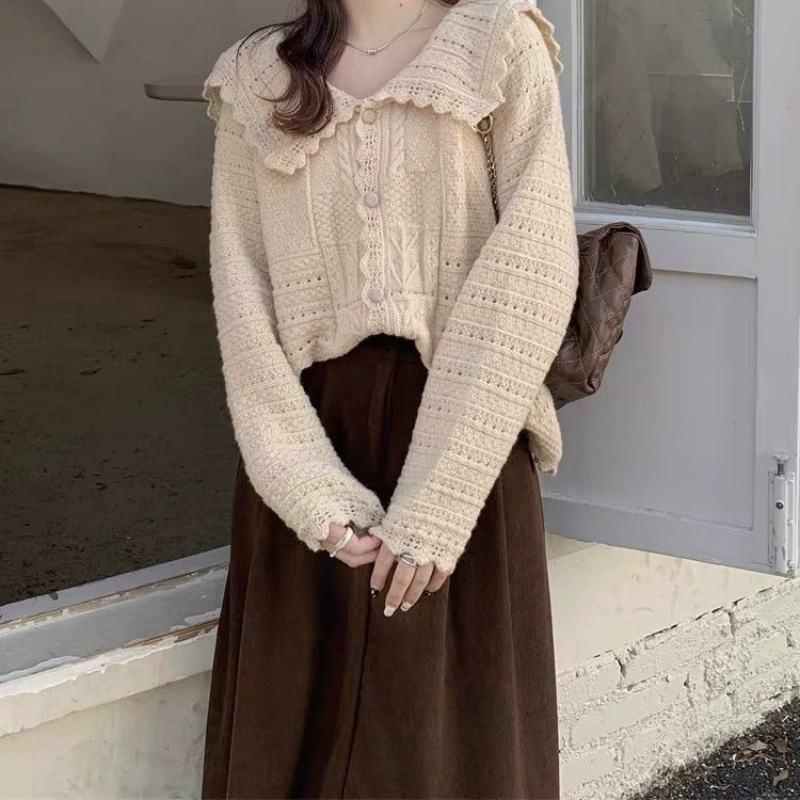 Нежный стиль кукольный воротник мягкий восковой вязаный кардиган женский весна и осень 2023 новый сладкий свободный свитер для похудения пальто для женщин