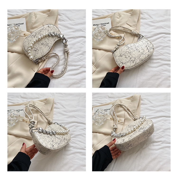 French chain armpit bag, women's high-end sense, niche trendy fashion handbag, western-style crescent bag_voghion.com