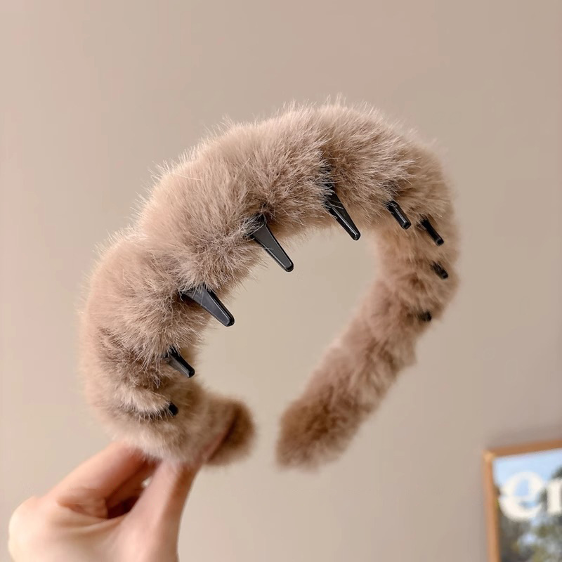 Temperamento coreano de leopardo ondulado banda de cabello mujer alta sensación de moda de presión de aire extranjera broca de cabello de peluche de otoño y invierno cabeza de cabeza alta