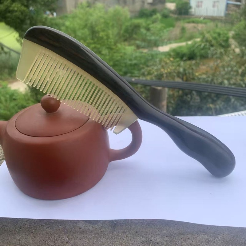 爆款紫光檀镶羊角齿加厚鼓柄梳鼓柄镶羊角齿按摩梳檀木按摩|undefined