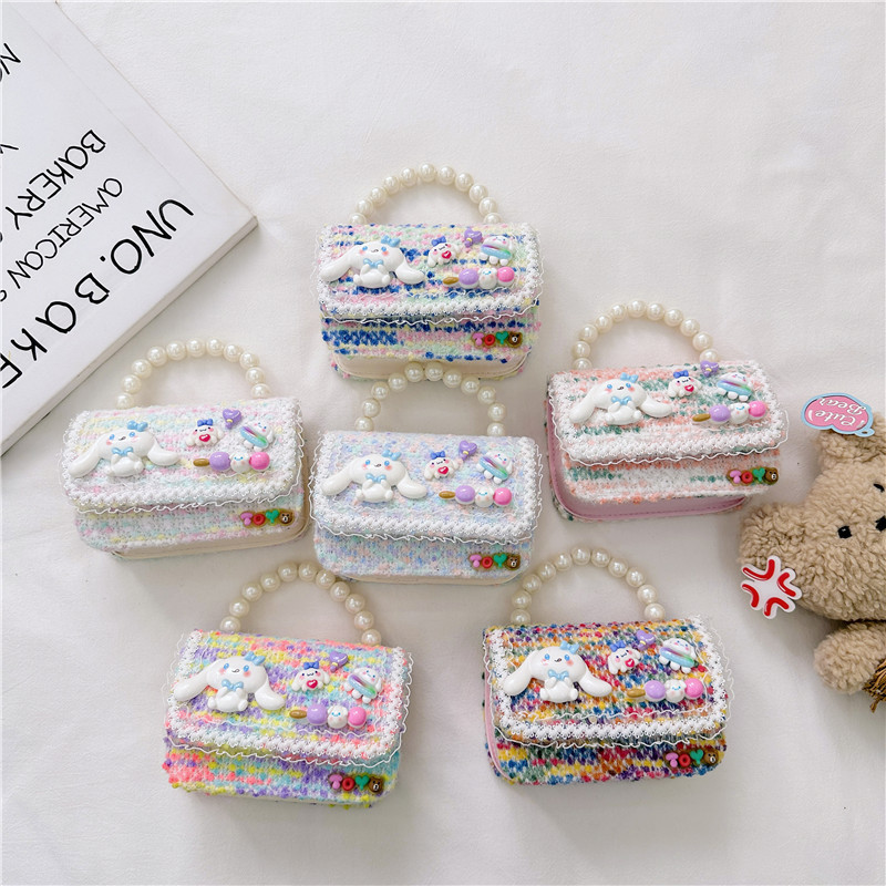 Otoño e Invierno nueva niña monedero dibujos animados lindo accesorios perla bolso versátil estilo occidental bebé bolsa de hombro