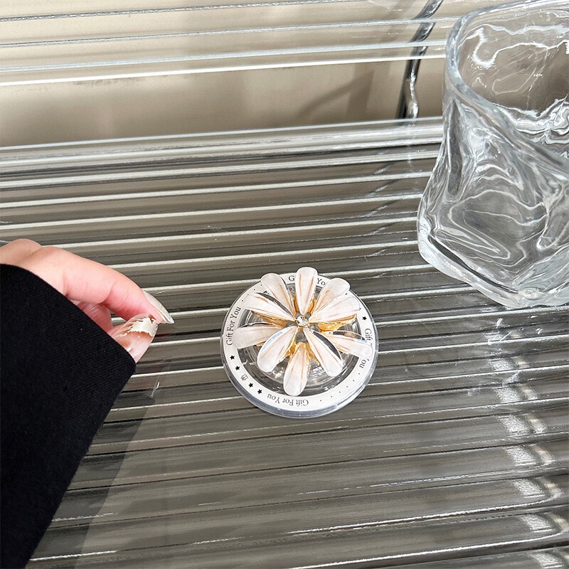 MagSafe磁気ホルダーに適しています。立体的なパールリボンとデイジーのホットスタイル、超吸着力と格納式です。|undefined