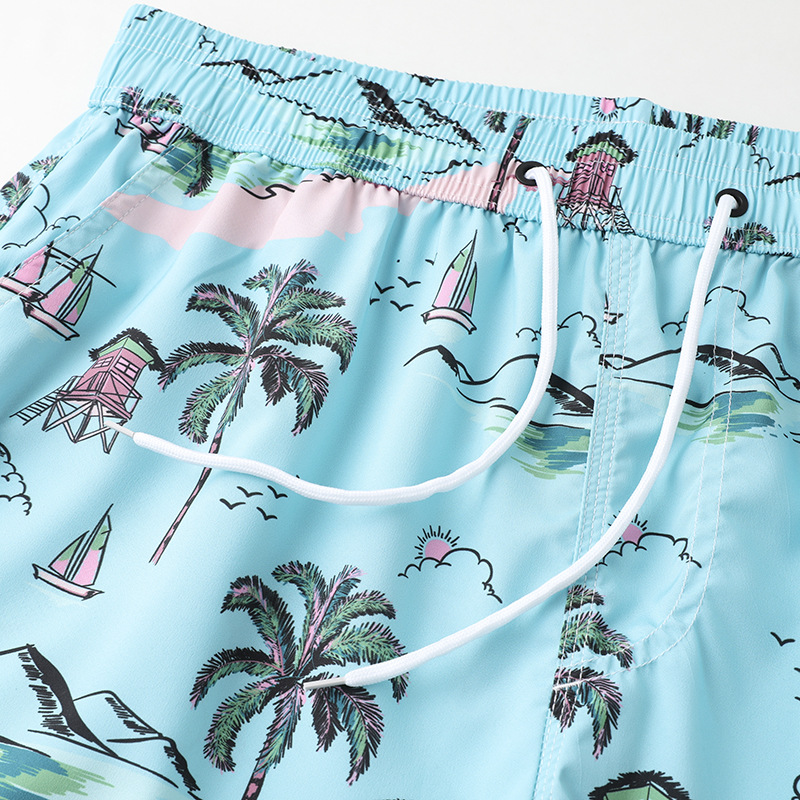 Pantalones de playa sueltos de secado rápido de verano para hombres y mujeres, pantalones cortos de flores de surf de vacaciones en la playa, pantalones de cinco puntos para parejas, pantalones grandes casuales