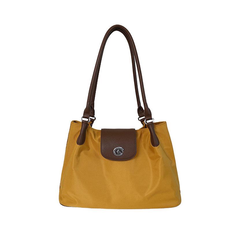 Bolsos de alta calidad de gran capacidad para mujeres 2026 nueva moda moda de nylon ligero de viaje de hombro bolso axilar