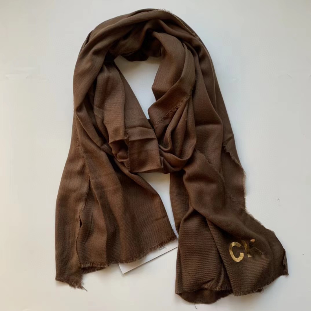 다크 브라운 브론징 로고