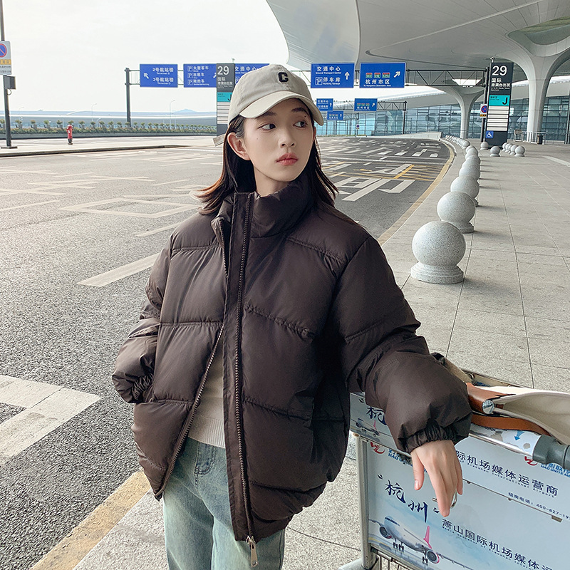 2024 nuevo algodón de pluma de invierno de mujer engrosado chaqueta de algodón coreana pequeña moda suelta ropa de pan