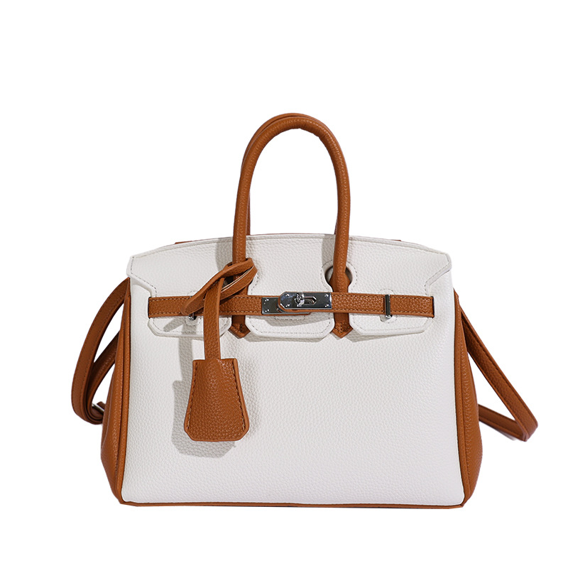 Bolso de platino portátil de litchi para mujeres 2026 comercio exterior nuevo estilo de alto nivel de sensación de tamaño de estilo de hombro mochila