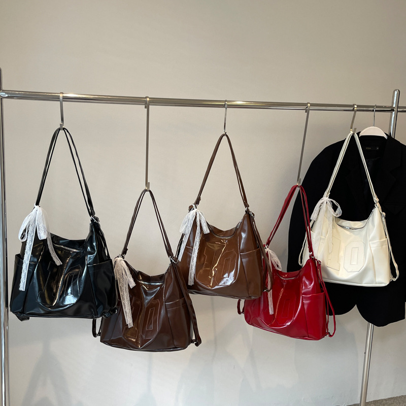 2024 nuevo bolso de plata de gran capacidad de ocio de mujer Semmeng mochila de hombro mochila de viaje bolsa de cubo