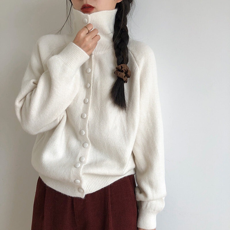 Korean-style high-neck knitted cardigan for women, 2026 new season, retro and casual style, with a luxurious feel, and a thickened knit outerwear Korean-style high-neck knitted cardigan for women, 2026 new season, retro and casual style, with a luxurious feel, and a thickened knit outerwear