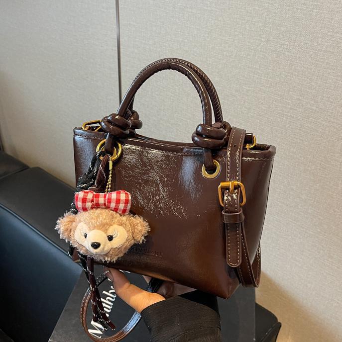 Otoño y invierno Meirad bolsos de mujer 2024 nueva moda moda bolsos de cubo de mano alta sensación de mochila versátil