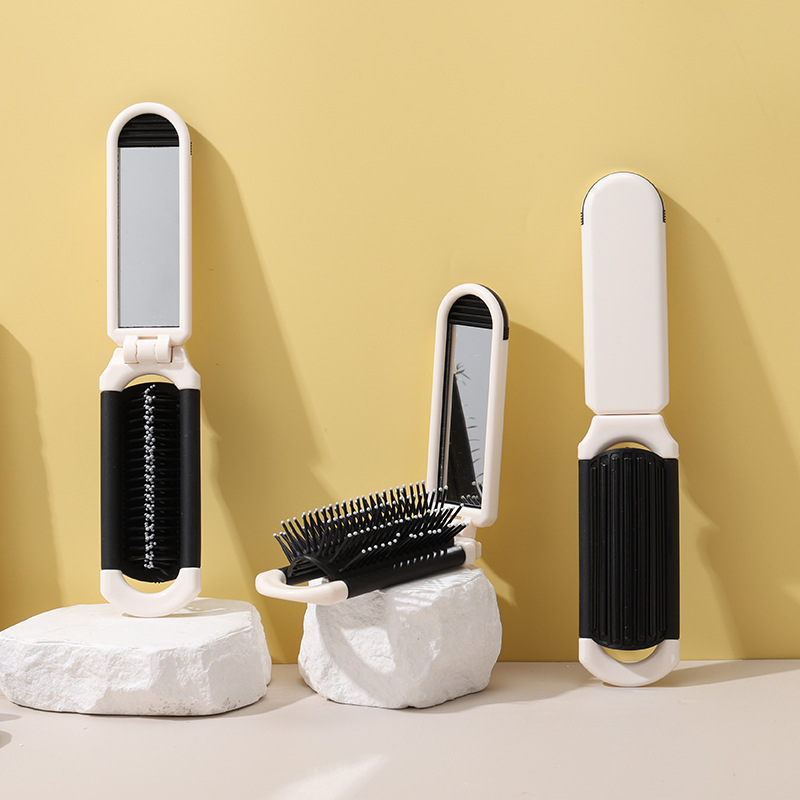 Shunfa plegable espejo peine de plástico de viaje portátil plegable airbag peine portátil espejo cosmético de doble uso integrado espejo peine