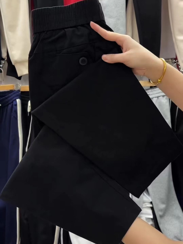 ヨーロッパの商品の夏の薄いタイプの9分のズボンの女性の新型の高弾性の綿のゆったりしている腰のハーレムのズボンの百合はやせているおばあさんのズボンを現します。|undefined