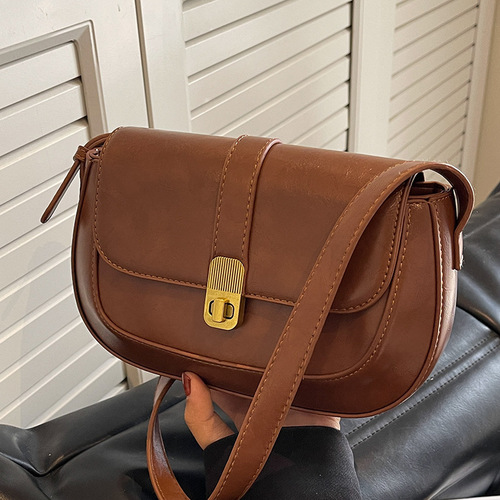 High-end bag women's autumn and winter retro 2024 new fashion niche design single shoulder crossbody bag popular saddle bag