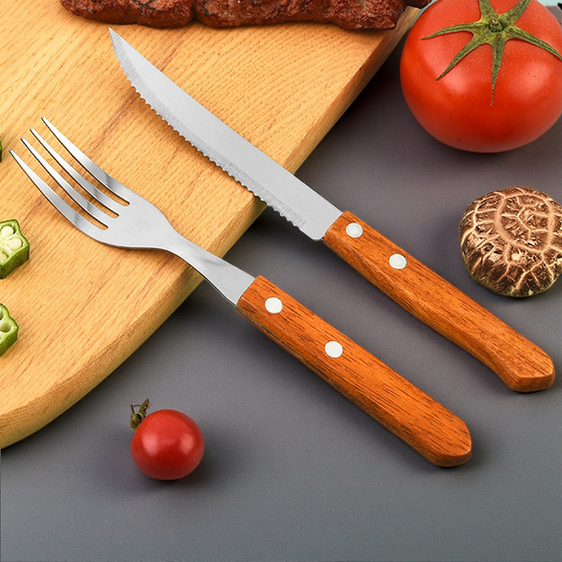 Cuchillo y tenedor de acero inoxidable explotador transfronterizo cubiertos occidentales cuchillo y tenedor de filete conjunto de sopas de sopa mango de madera de cinco piezas conjunto de cuchillo y tenedor afilado