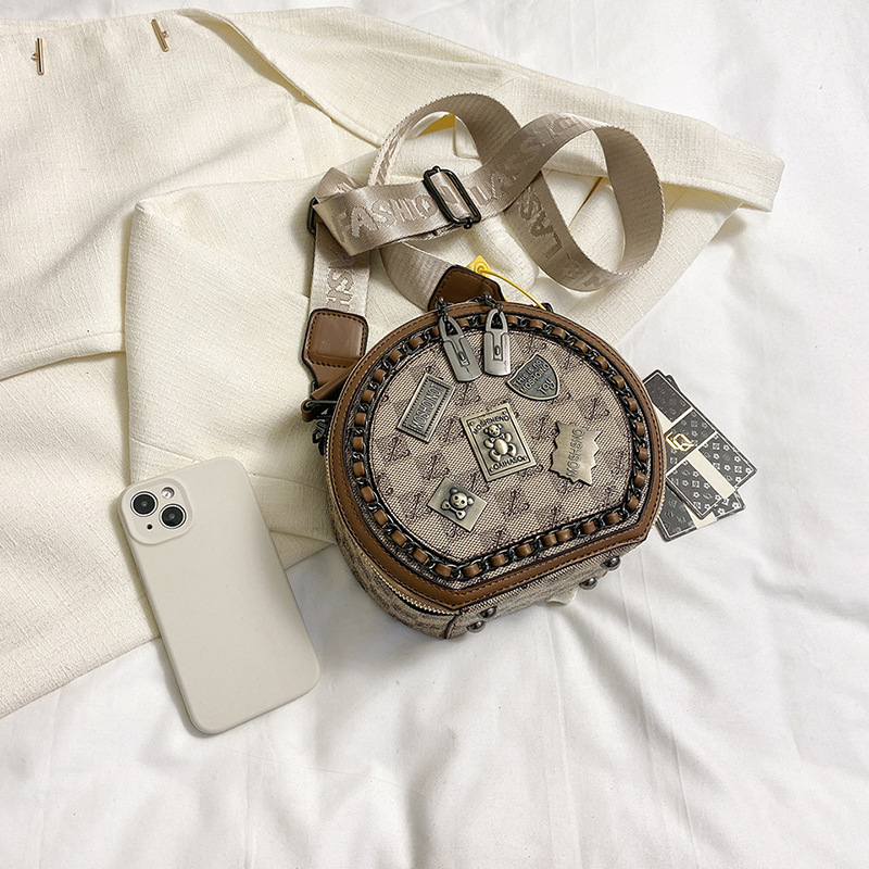 Bolsa de insignia de nicho de alta calidad para mujeres 2023 primavera nueva moda estilo coreano todo partido hombro crossbody pequeña bolsa redonda