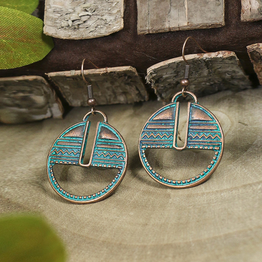 1 Pair Retro Solid Color Hollow Out Zinc Alloy Drop Earrings display picture 5