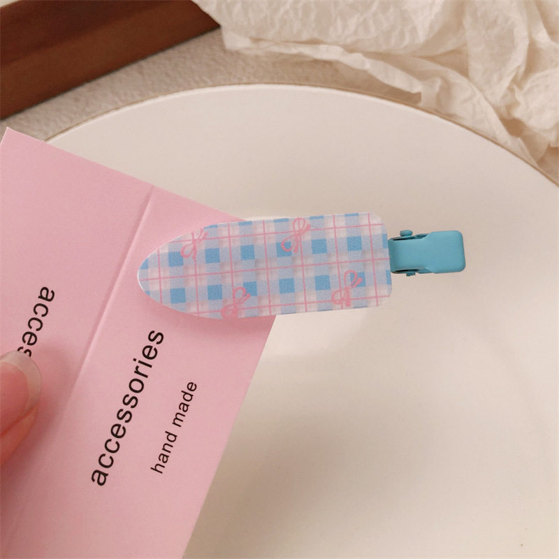 Un par de impresión de arco para niñas pinzas de cabello sin marcas de dibujos animados para mujeres adorables pinzas de cabello para el cabello de bordas rotas