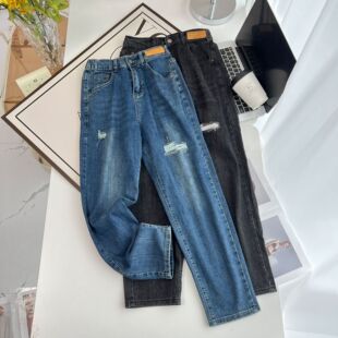 Large size women's radish pants spring and autumn new 200kg fat sister slim elastic hole denim harem pants 7024