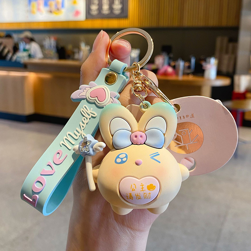 Caricatura goteo de pegamento Maji conejo llavero accesorios interesantes bonitos bolsos escolares colgante llavero de mujer al por mayor