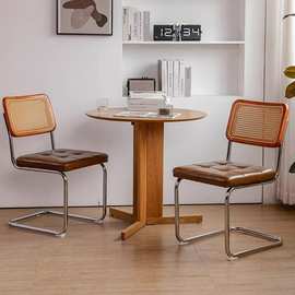 网红藤编书桌椅家用法式轻奢餐椅中古弓形咖啡厅佗寂休闲皮革椅子