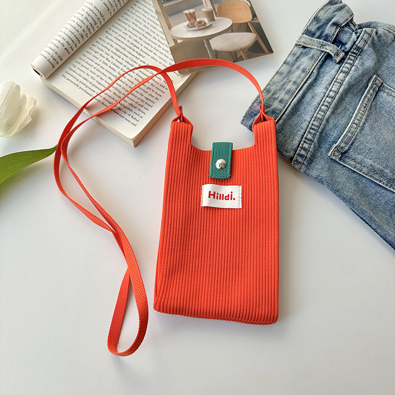 Primavera nuevo color sólido de punto de hombro mochila bolso móvil de moda versátil bolso de dopamina para hombres y mujeres