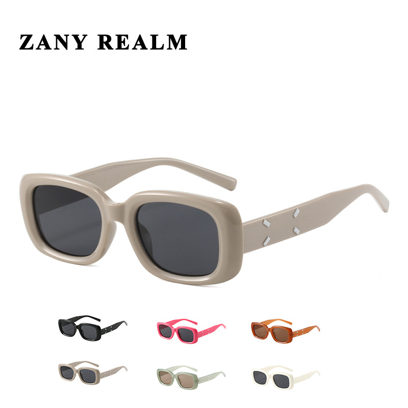 Xiaohongshu mismo estilo personalidad gafas de sol de montura pequeña gafas de sol de moda hip-hop nuevo color caramelo street shooting versión coreana al por mayor