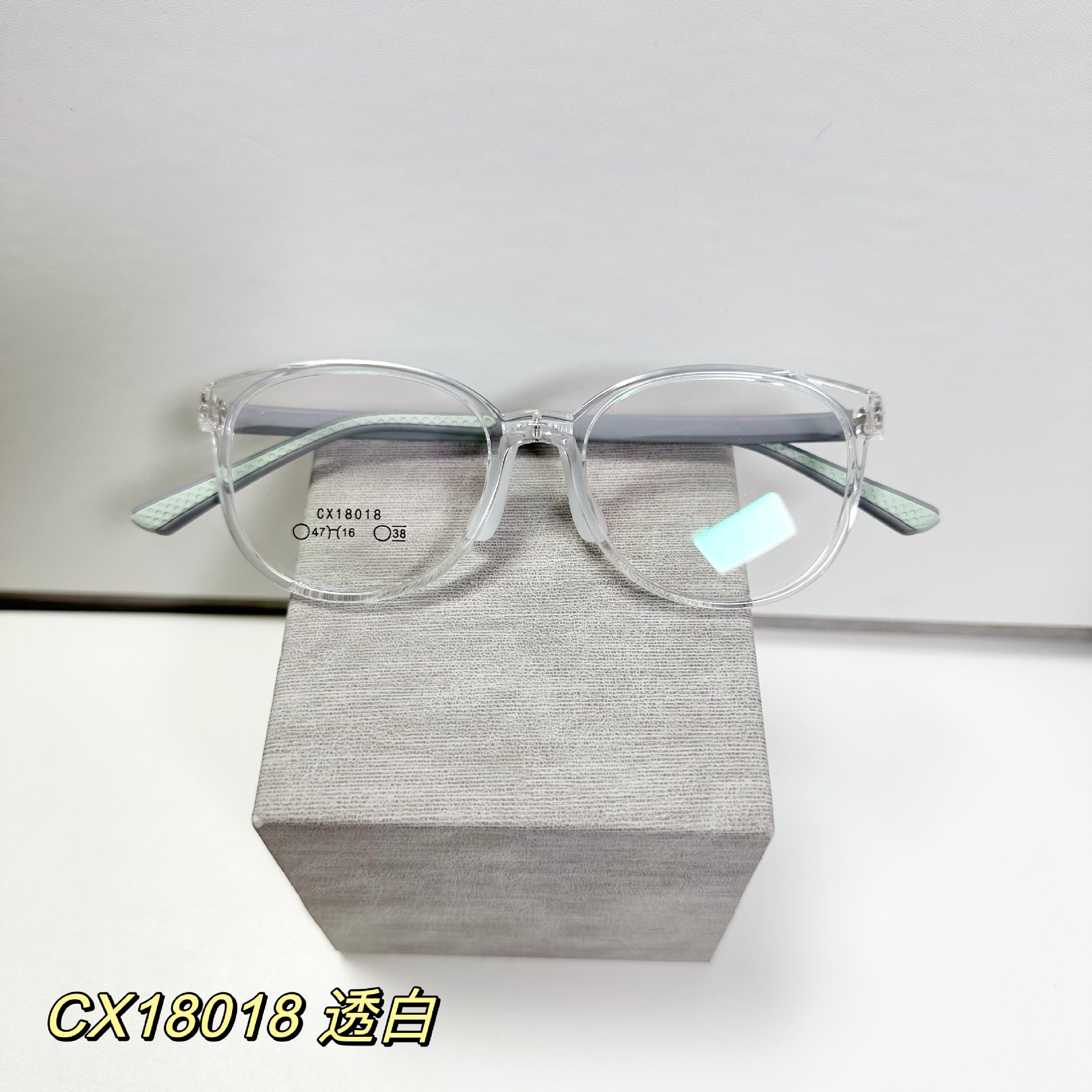 Montura de gafas infantiles translúcidas de color morado con almohadillas nasales de silicona ajustables, se pueden adaptar con lentes graduadas, venta al por mayor desde Danyang.