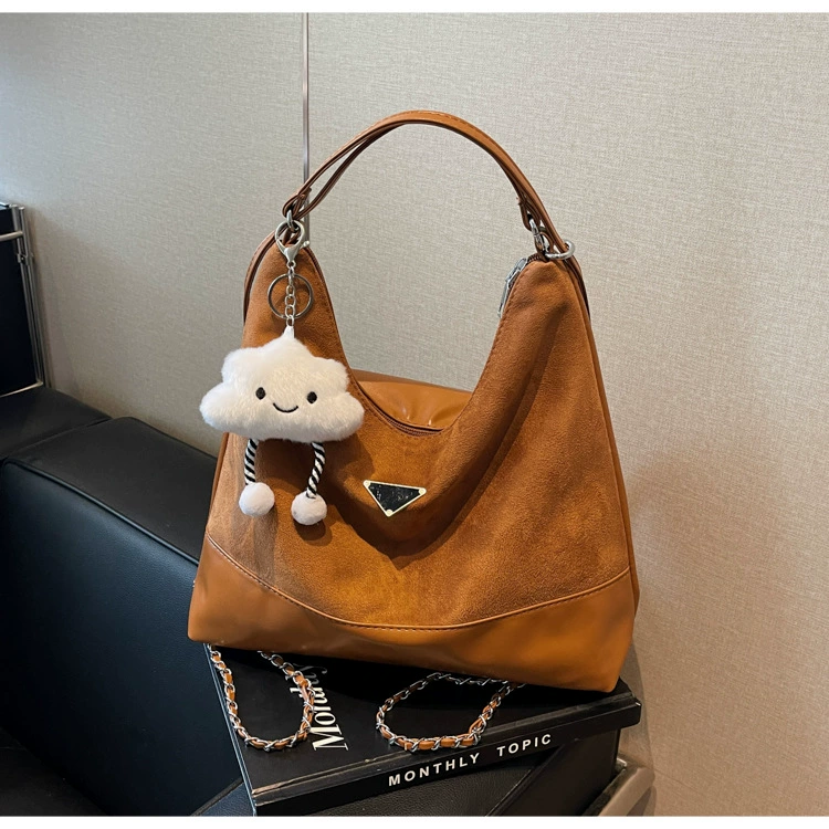 Capacious one-shoulder bag, trend shoulder bag, worn on the shoulder