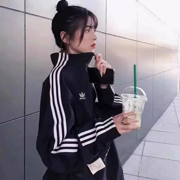 The same style 2025 trendy brand spring and autumn thin jacket for men and women, stand-up collar, breathable, classic windbreaker, versatile jacket