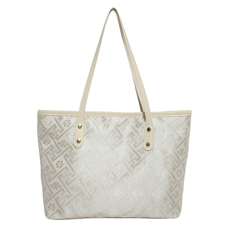 2025 nuevo estilo nacional de diseño de patrón oscuro bolso de mujer gran capacidad versátil bolso de viaje bolso de hombro de moda ligero de lujo