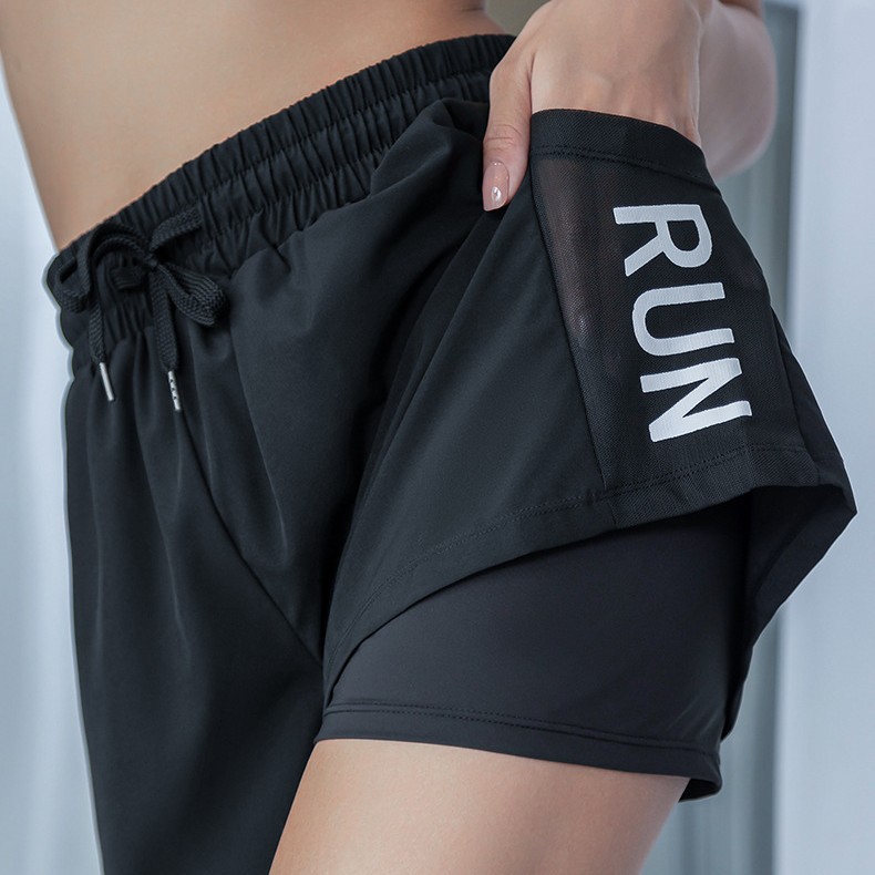 Pantalones cortos deportivos femeninos sueltos anti-vagabundo gimnasio entrenamiento para correr delgado pantalones casuales de yoga de cintura alta verano