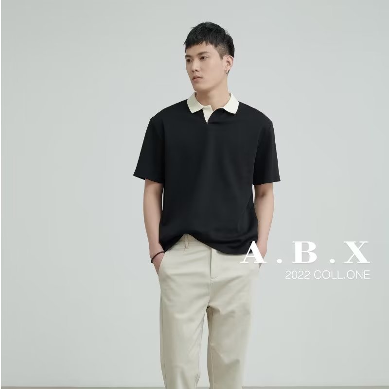 Verano nuevo estilo 2024 nueva tendencia estilo ligero maduro diseño de costura especial camiseta de manga corta camisa POLO hombre