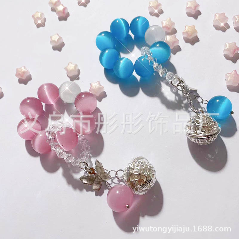 新款白月光猫眼石宫玲铃铛编织手串复古编织绕指柔手捻女款蝴蝶