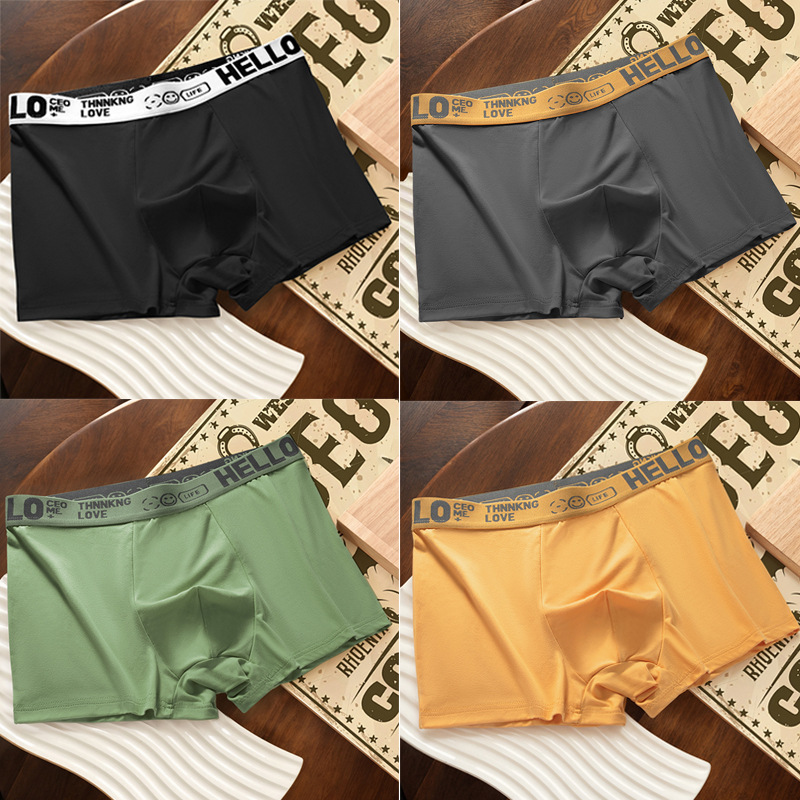 Ropa interior masculina, letras juveniles, cintura media suelta y cómoda, transpirable y sin costuras, pantalones cortos de cuatro esquinas para estudiantes al por mayor