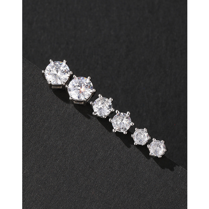 S925 plata esterlina seis-garra Stud pendientes simple europeo y americano hip hop circón Super Flash pendientes hombres y mujeres populares de alto grado pendientes